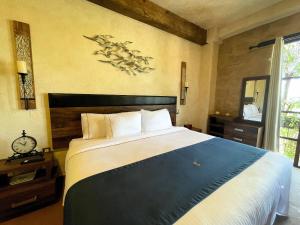 Postel nebo postele na pokoji v ubytování Hotel Pietro Santo