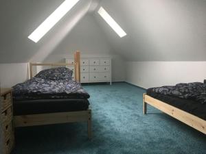 Postel nebo postele na pokoji v ubytování Holiday apartment Ponywiese