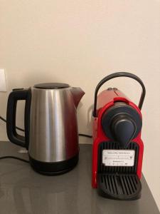 a tea pot and kettle on a table at Pae veciu casa vacanze in Monterosso al Mare