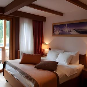 Giường trong phòng chung tại Apartments B229 & B230 in Aparthotel Vucko, Jahorina -private host +79 ảnh