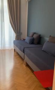 Posteľ alebo postele v izbe v ubytovaní NAPOLIFOREVER Chiaia APARTMENT