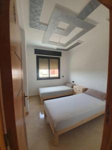 Voodi või voodid majutusasutuse Appartement Maghrib Jadid toas