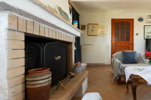 A television and/or entertainment centre at Jacuzzi Pool House AMA5690
