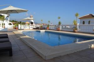 The swimming pool at or close to Villa Las Golondrinas