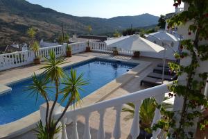 The swimming pool at or close to Villa Las Golondrinas