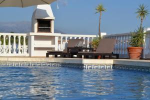 The swimming pool at or close to Villa Las Golondrinas