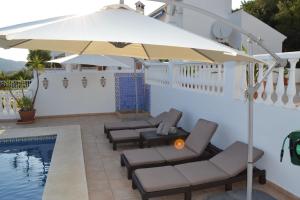 The swimming pool at or close to Villa Las Golondrinas