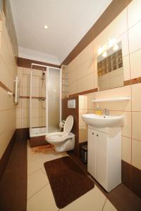Koupelna v ubytování Apartamenty w Jantar - LilaSun