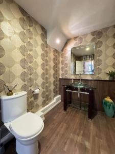 a bathroom with a toilet and a sink at Riverside House, North Shields Fish Quay in South Shields