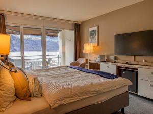 Postel nebo postele na pokoji v ubytování Seehotel Riviera at Lake Lucerne