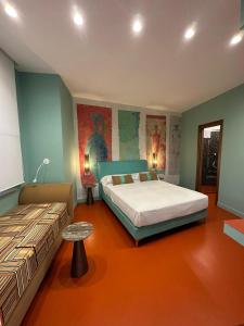 Postel nebo postele na pokoji v ubytování Sorrento Rooms Deluxe