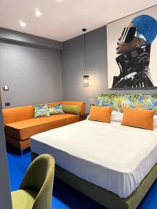 Postel nebo postele na pokoji v ubytování Sorrento Rooms Deluxe