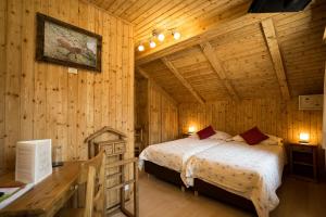 Katil atau katil-katil dalam bilik di Hotel de Moiry Supérieur