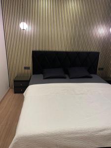 Кровать или кровати в номере G3A2 apartment