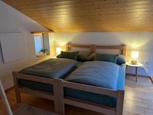Katil atau katil-katil dalam bilik di Wohnung am Postweg
