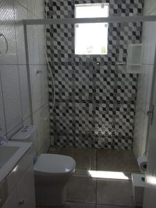 Phòng tắm tại Casa das Palmeiras