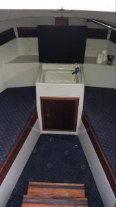 a bath tub in the center of a boat at Yacht & Breakfast in Bergen