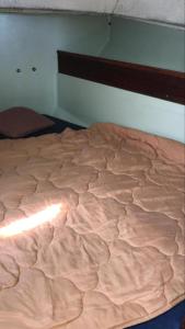 En eller flere senge i et værelse på Yacht & Breakfast