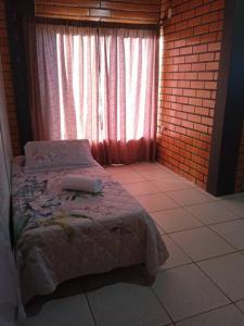 Кровать или кровати в номере Casa Tia Dori