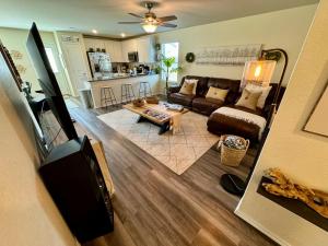 a living room with a couch and a table at Superb Home 7 minutes from Lackland Air Force Base in San Antonio