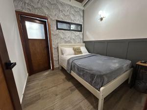 Postel nebo postele na pokoji v ubytování Beach Apartment Villas Jubey, Emotion access