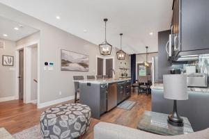 an open kitchen and living room in a home at Vi Cottage in North Saanich
