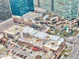 an overhead view of a city with tall buildings at Uptown Parksuites BGC in Manila