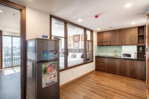 Kjøkken eller kjøkkenkrok på Langmandi Hotel & Apartment