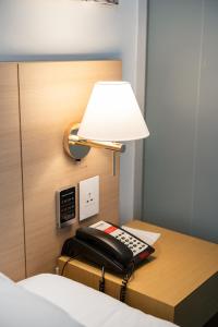 트레블로지 명동 을지로 호텔 객실 침대