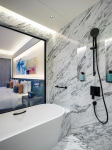 Voodi või voodid majutusasutuse Andaz Macau, By Hyatt toas