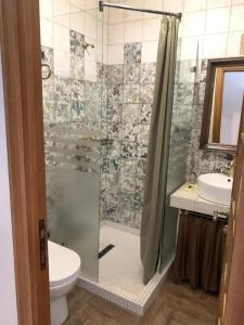 Koupelna v ubytování Boutique ETHNO HOTEL