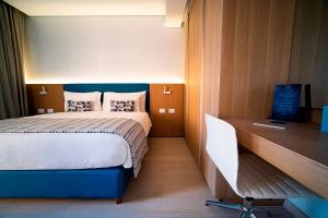 Voodi või voodid majutusasutuse Monot Suites toas