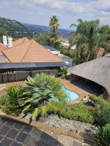 an overhead view of a house with a swimming pool at Boutique Stay in Johannesburg