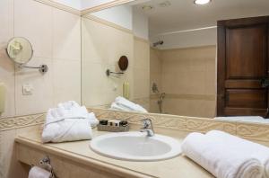 Koupelna v ubytování Likoria Hotel