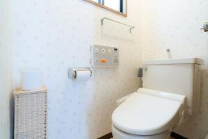 Ванна кімната в 最大10人から25人まで宿泊可能三宮駅至近1フロア貸切コンドミニアム