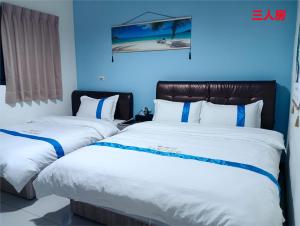 Letto o letti in una camera di 塔斯汀精品民宿