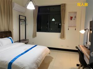 Letto o letti in una camera di 塔斯汀精品民宿