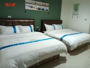 Letto o letti in una camera di 塔斯汀精品民宿