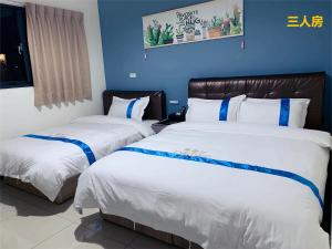 Letto o letti in una camera di 塔斯汀精品民宿