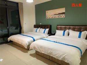 Letto o letti in una camera di 塔斯汀精品民宿