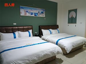 Letto o letti in una camera di 塔斯汀精品民宿