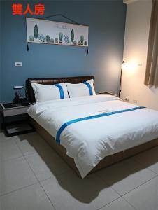 Letto o letti in una camera di 塔斯汀精品民宿