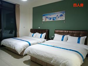 Letto o letti in una camera di 塔斯汀精品民宿