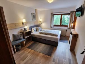 Postel nebo postele na pokoji v ubytování Haus Barbara