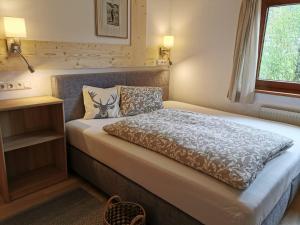 Letto o letti in una camera di Haus Barbara