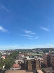 a view of a city with buildings and a blue sky at 521 CityView Poised Paleis in Johannesburg
