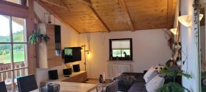 Et tv og/eller underholdning på Apartment Bergblick Lohnerlehen