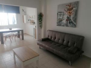 A seating area at Agradable casa para disfrutar con los tuyos