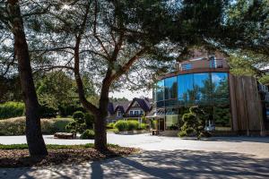 Vonkajšia záhrada v ubytovaní Hotel Pory Roku
