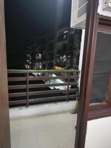 En balkon eller terrasse på The Raveesh Apartment B6